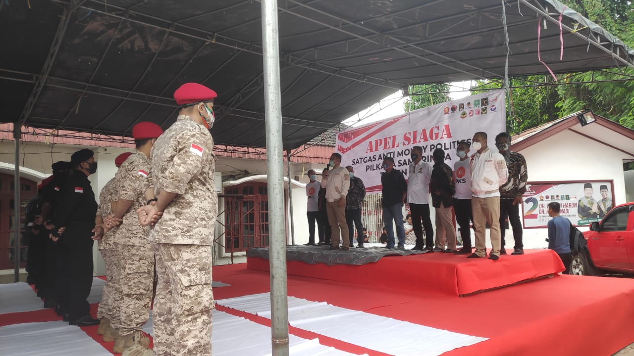 Suasana apel siaga yang dilakukan tim paslon 02, Minggu (6/12/2020).